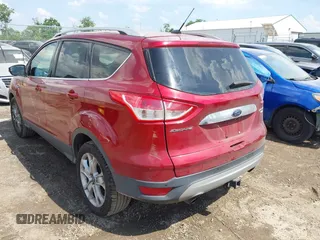 2015 Ford Escape Titanium z VIN 1FMCU9J91FUC58933, wystawiony jako IAAI lot #42583736 z przebiegiem 147 359 mil mil oraz . Historia ofert i sprzedaży dostępna na DreamBid. Obrazek 3.