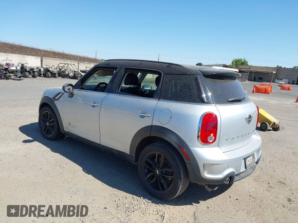 2014 MINI Countryman S with VIN WMWZC5C54EWP40882, listed as a IAAI auction lot 42633141 with 176,641 mi miles and . Bid and sale history available at DreamBid. Image 3.