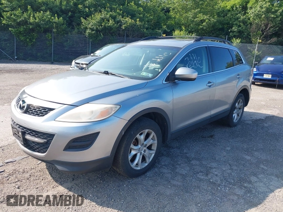 2012 Mazda CX-9 Touring with VIN JM3TB3CV7C0365934, listed as a IAAI auction lot 42381671 with 237,298 mi miles and . Bid and sale history available at DreamBid. Image 2.