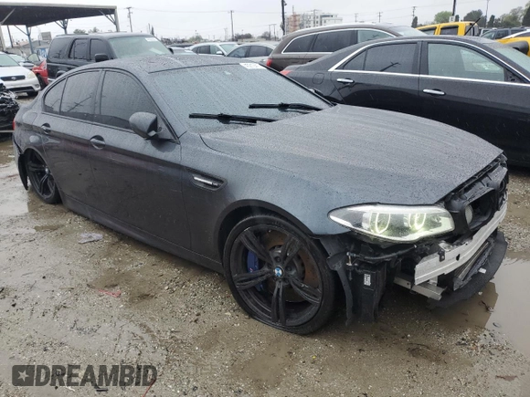 2014 BMW M5 with VIN WBSFV9C5XED593740, listed as a Copart auction lot 45210415 with 76,583 mi miles and Clean Title. Bid and sale history available at carsss.com. Image 4.