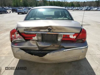 2005 Mercury Grand Marquis LS Premium z VIN 2MEFM75W95X642339, wystawiony jako Copart lot #50391035 z przebiegiem 127 526 mil mil oraz Szkoda całkowita • Salvage title. Historia ofert i sprzedaży dostępna na DreamBid. Obrazek 6.
