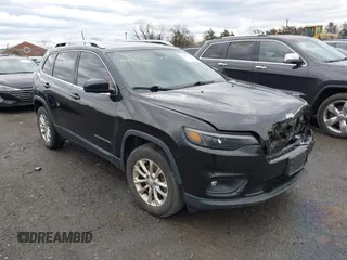 2019 Jeep Cherokee Latitude with VIN 1C4PJMCX7KD230450, listed as a IAAI auction lot 41474709 with 172,684 mi miles. Bid and sale history available at carsss.com. Image 1.