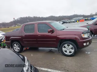 2009 Honda Ridgeline RTL with VIN 5FPYK16529B100032, listed as a IAAI auction lot 41206781 with 130,694 mi miles and . Bid and sale history available at DreamBid. Image 13.