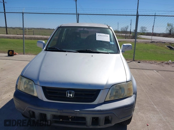 1999 Honda CR-V EX with VIN JHLRD1867XC060816, listed as a IAAI auction lot 41823958 with 220,322 mi miles. Bid and sale history available at carsss.com. Image 6.
