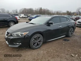 2016 Nissan Maxima SL with VIN 1N4AA6AP3GC436677, listed as a Copart auction lot 49880185 with 128,748 mi miles and Salvage Title. Bid and sale history available at DreamBid. Image 1.