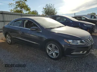 2014 Volkswagen CC R-Line with VIN WVWBP7AN8EE506189, listed as a Copart auction lot 75362924 with 124,692 mi miles and Clean Title. Bid and sale history available at carsss.com. Image 4.