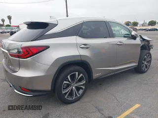 2021 Lexus RX 450h with VIN 2T2HGMDA3MC060208, listed as a IAAI auction lot 42163455 with 34,167 mi miles and . Bid and sale history available at DreamBid. Image 4.