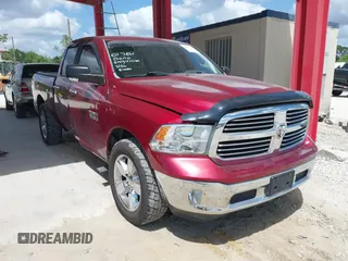 2015 Ram 1500 SLT z VIN 1C6RR6GG0FS658599, wystawiony jako IAAI lot #41971117 z przebiegiem 107 224 mil mil oraz . Historia ofert i sprzedaży dostępna na DreamBid. Obrazek 1.