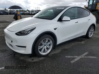 2021 Tesla Model Y Long Range with VIN 5YJYGDEE2MF303332, listed as a Copart auction lot 48242405 with 80,279 mi miles and Salvage Title. Bid and sale history available at DreamBid. Image 1.