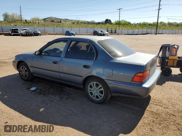 1994 Toyota Corolla with VIN 1NXAE04B7RZ129212, listed as a Copart auction lot 56760095 with 156,822 mi miles and Non repairable. Bid and sale history available at DreamBid. Image 2.