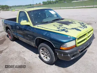 1999 Dodge Dakota SLT z VIN 1B7FL26X8XS123416, wystawiony jako IAAI lot #42277786 z przebiegiem 220 697 mil mil oraz . Historia ofert i sprzedaży dostępna na DreamBid. Obrazek 1.