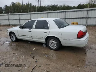 2003 Mercury Grand Marquis GS Convenience z VIN 2MEFM74W53X702387, wystawiony jako Copart lot #52852475 z przebiegiem 246 543 mil mil oraz Szkoda całkowita • Salvage title. Historia ofert i sprzedaży dostępna na DreamBid. Obrazek 2.