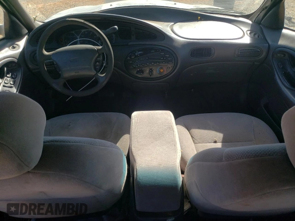 1999 Ford Taurus SE z VIN 1FAFP53U9XA141550, wystawiony jako Copart lot #48824305 z przebiegiem 203 517 mil mil oraz Szkoda całkowita • Salvage title. Historia ofert i sprzedaży dostępna na DreamBid. Obrazek 8.