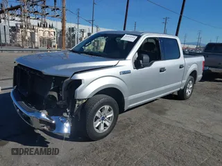 2015 Ford F-150 XLT with VIN 1FTEW1C8XFKE17196, listed as a IAAI auction lot 41414904 with 150,866 mi miles and . Bid and sale history available at carsss.com. Image 17.