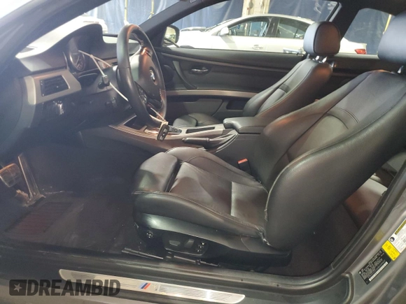 2011 BMW 3 Series 335is with VIN WBAKG1C56BE599457, listed as a Copart auction lot 52412655 with 134,497 mi miles and Clean title. Bid and sale history available at DreamBid. Image 7.
