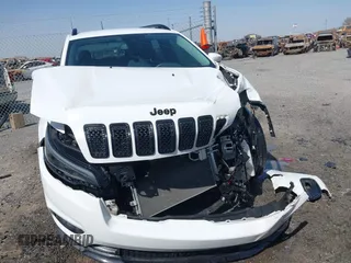 2021 Jeep Cherokee Altitude with VIN 1C4PJLLB1MD180422, listed as a IAAI auction lot 41830952 with 73,839 mi miles. Bid and sale history available at carsss.com. Image 12.