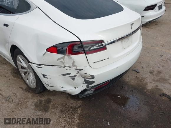 2016 Tesla Model S 70 with VIN 5YJSA1E12GF172359, listed as a IAAI auction lot 42107587 with Not provided miles and . Bid and sale history available at DreamBid. Image 6.