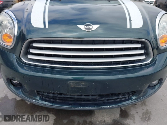 2012 MINI Countryman with VIN WMWZB3C54CWM01897, listed as a IAAI auction lot 42083668 with 132,417 mi miles and . Bid and sale history available at DreamBid. Image 6.
