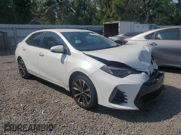 2019 Toyota Corolla L with VIN 5YFBURHE5KP921284, listed as a Copart auction lot 54277235 with 100,935 mi miles and Salvage Title. Bid and sale history available at DreamBid. Image 4.