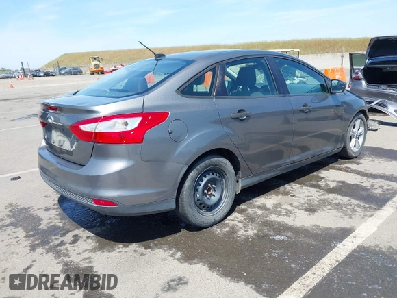 2012 Ford Focus S with VIN 1FAHP3E26CL321687, listed as a IAAI auction lot 42159853 with 139,702 mi miles and . Bid and sale history available at DreamBid. Image 4.