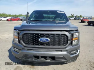 2023 Ford F-150 XL with VIN 1FTEW1CP4PKD21685, listed as a Copart auction lot 54992615 with 27,252 mi miles and Salvage title. Bid and sale history available at DreamBid. Image 5.