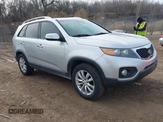 2011 Kia Sorento EX with VIN 5XYKUDA20BG061415, listed as a IAAI auction lot 41808125 with 167,688 mi miles. Bid and sale history available at carsss.com. Image 1.
