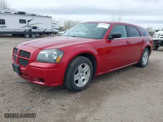 2005 Dodge Magnum SE with VIN 2D4FV48V75H129698, listed as a IAAI auction lot 41850776 with 121,019 mi miles. Bid and sale history available at carsss.com. Image 2.