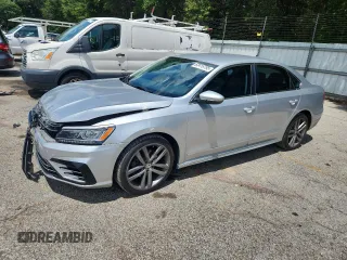 2016 Volkswagen Passat S with VIN 1VWAS7A32GC058844, listed as a Copart auction lot 63416785 with 104,050 mi miles and Salvage title. Bid and sale history available at DreamBid. Image 1.