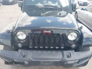2015 Jeep Wrangler Unlimited Sahara with VIN 1C4HJWEG6FL572674, listed as a IAAI auction lot 42736266 with 97,024 mi miles and . Bid and sale history available at DreamBid. Image 6.