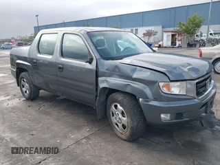 2011 Honda Ridgeline RT with VIN 5FPYK1F27BB453796, listed as a IAAI auction lot 41126251 with 122,746 mi miles. Bid and sale history available at carsss.com. Image 1.