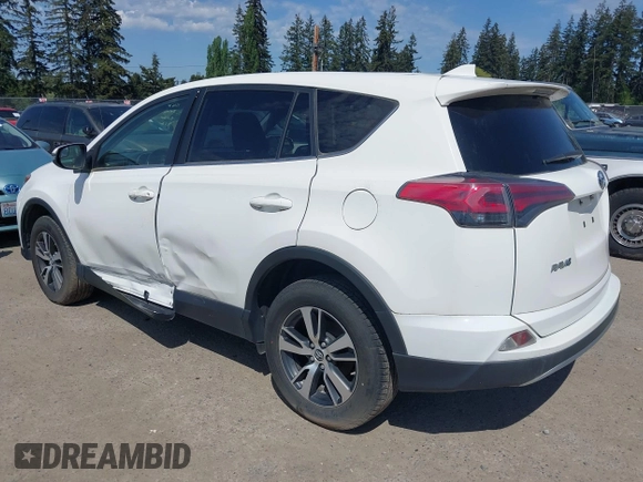 2018 Toyota RAV4 XLE with VIN JTMWFREV3JD130995, listed as a IAAI auction lot 42183630 with 56,624 mi miles. Bid and sale history available at carsss.com. Image 3.