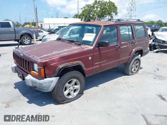 2000 Jeep Cherokee z VIN 1J4FF48S7YL129654, wystawiony jako IAAI lot #42201026 z przebiegiem 272 922 mil mil oraz . Historia ofert i sprzedaży dostępna na DreamBid. Obrazek 2.