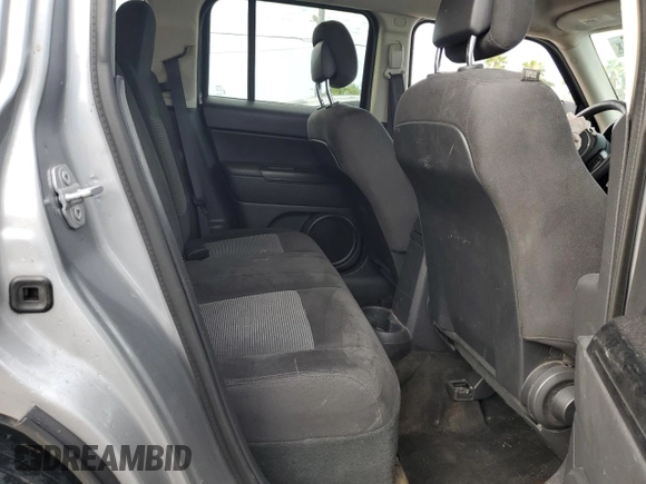 2016 Jeep Patriot Sport with VIN 1C4NJRBB8GD556940, listed as a Copart auction lot 57268185 with 120,297 mi miles and Salvage title. Bid and sale history available at DreamBid. Image 11.