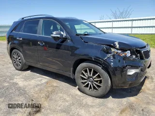 2013 Kia Sorento SX z VIN 5XYKW4A29DG382771, wystawiony jako Copart lot #55823745 z przebiegiem 279 700 mil mil oraz Szkoda całkowita • Salvage title. Historia ofert i sprzedaży dostępna na DreamBid. Obrazek 4.