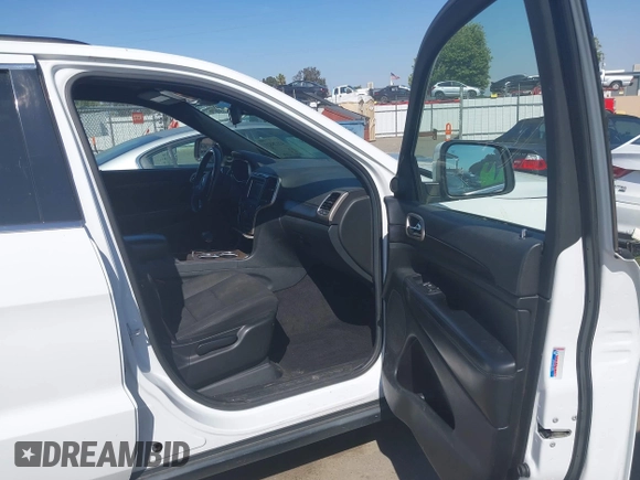 2014 Jeep Grand Cherokee Laredo with VIN 1C4RJFAG9EC334021, listed as a IAAI auction lot 42128823 with 161,741 mi miles. Bid and sale history available at carsss.com. Image 5.