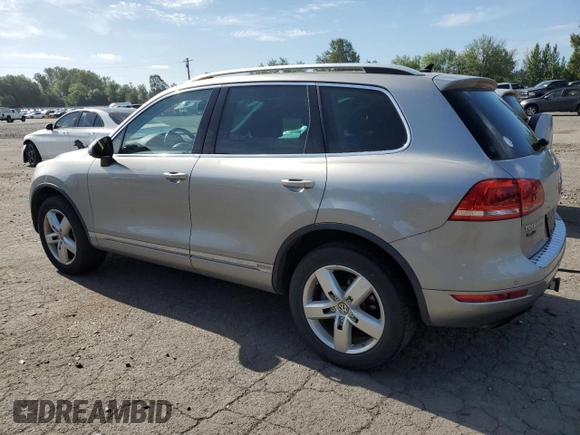 2012 Volkswagen Touareg с VIN WVGEG9BP6CD008533, выставлен на аукционе Copart как лот 60356345 с пробегом 103 270 миль миль и Чистый • Clean title. История ставок и продаж доступна на DreamBid. Изображение 2.