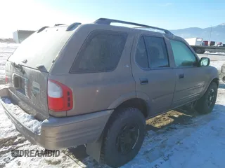 2002 Isuzu Rodeo with VIN 4S2DM58W824320291, listed as a IAAI auction lot 41385761 with 177,441 mi miles. Bid and sale history available at carsss.com. Image 4.