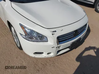 2014 Nissan Maxima SV with VIN 1N4AA5AP8EC460884, listed as a IAAI auction lot 42030564 with 189,108 mi miles and . Bid and sale history available at DreamBid. Image 6.