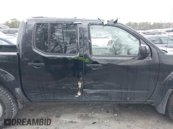 2015 Nissan Frontier SV with VIN 1N6AD0EV1FN766745, listed as a IAAI auction lot 41553521 with 107,919 mi miles and . Bid and sale history available at DreamBid. Image 6.