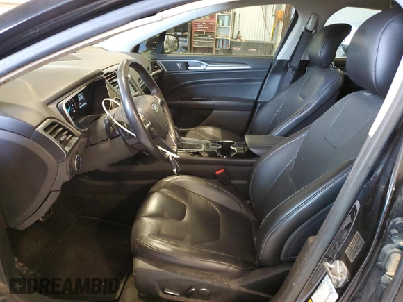 2014 Ford Fusion Titanium with VIN 3FA6P0K94ER231241, listed as a Copart auction lot 47886135 with 70,925 mi miles and Salvage Title. Bid and sale history available at DreamBid. Image 7.