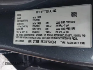 2020 Tesla Model 3 Long Range z VIN 5YJ3E1EBXLF770064, wystawiony jako IAAI lot #41424909 z przebiegiem 96 972 mil mil oraz . Historia ofert i sprzedaży dostępna na DreamBid. Obrazek 9.