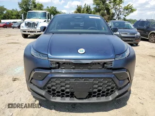 2023 Fisker Ocean One z VIN VCF1ZBU20PG004357, wystawiony jako Copart lot #64479144 z przebiegiem 7300 mil mil oraz Szkody całkowita. Historia ofert i sprzedaży dostępna na DreamBid. Obrazek 5.