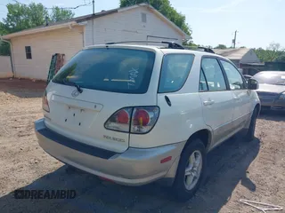2002 Lexus RX 300 with VIN JTJHF10U720256520, listed as a IAAI auction lot 42074976 with 198,551 mi miles and . Bid and sale history available at DreamBid. Image 4.