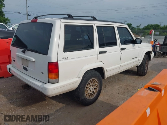 1998 Jeep Cherokee Sport z VIN 1J4FJ68S6WL124839, wystawiony jako IAAI lot #42421174 z przebiegiem 167 762 mil mil oraz . Historia ofert i sprzedaży dostępna na DreamBid. Obrazek 4.