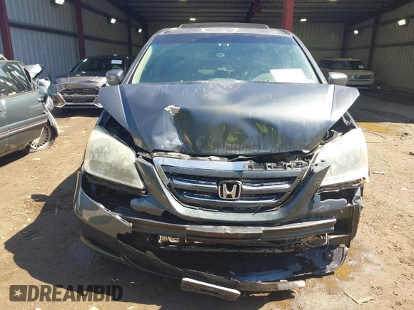 2005 Honda Odyssey EX-L with VIN 5FNRL387X5B069823, listed as a IAAI auction lot 41883007 with 267,250 mi miles and . Bid and sale history available at DreamBid. Image 6.