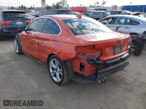 2015 BMW 2 Series 228i with VIN WBA1F9C56FVW98461, listed as a IAAI auction lot 41663193 with 94,584 mi miles. Bid and sale history available at carsss.com. Image 3.