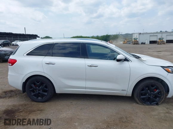 2018 Kia Sorento SX Limited with VIN 5XYPKDA55JG429852, listed as a IAAI auction lot 42823592 with 84,317 mi miles and . Bid and sale history available at DreamBid. Image 14.