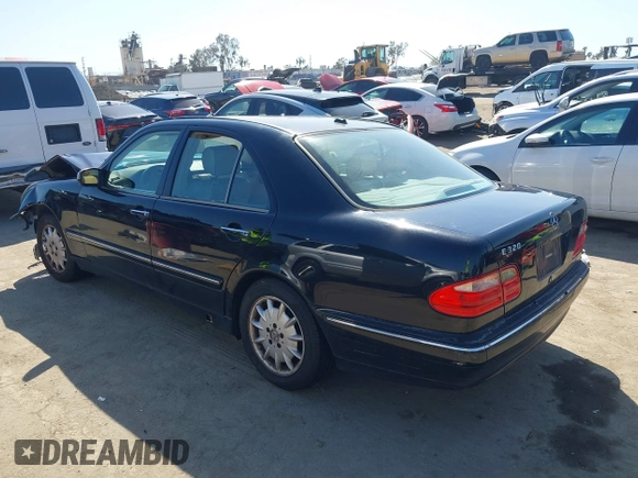 2001 Mercedes-Benz E-Class with VIN WDBJF65J11B368277, listed as a IAAI auction lot 41855716 with 207,864 mi miles. Bid and sale history available at carsss.com. Image 3.