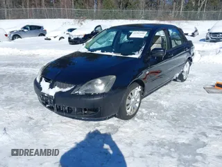 2006 Mitsubishi Lancer ES with VIN JA3AJ26E06U000385, listed as a IAAI auction lot 41587490 with 185,100 mi miles. Bid and sale history available at carsss.com. Image 2.