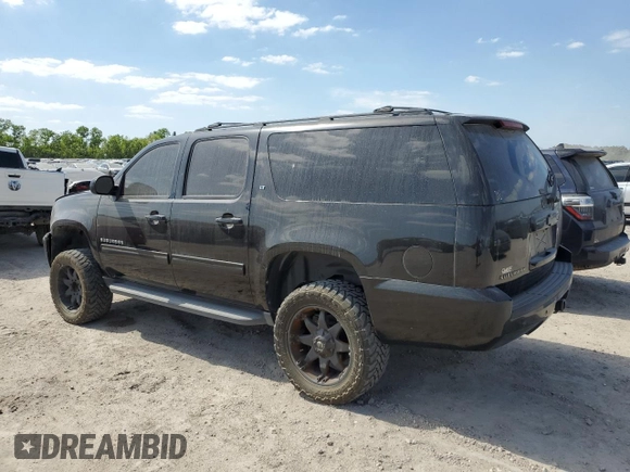 2013 Chevrolet Suburban with VIN 1GNWKMEG4DR361726, listed as a Copart auction lot 51539555 with 188,469 mi miles and Clean title. Bid and sale history available at DreamBid. Image 2.